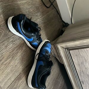 Blue and black Nikes